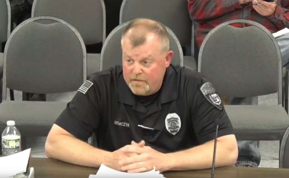 Officer Joseph Niemczyk talking about the program at the Board of Selectman Meeting