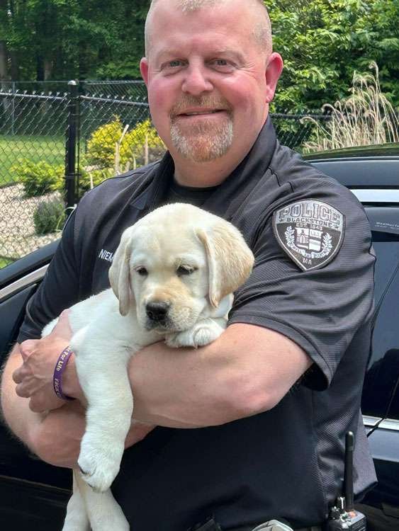 Blackstone comfort dog Captain with Officer Joseph Niemczyk

