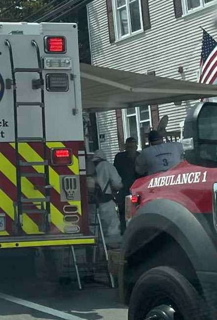 Guys on hazmat on Main St.